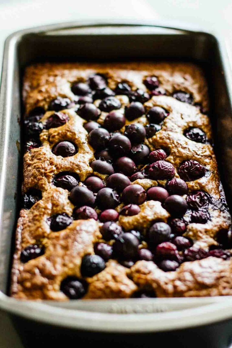 Close up of Gluten Free Blueberry Bread in a loaf tin