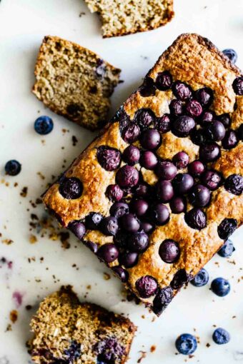 An overhead shot of Gluten Free Blueberry Bread on marble