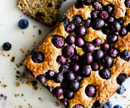 An overhead shot of Gluten Free Blueberry Bread on marble