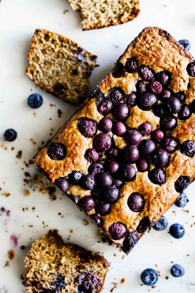 An overhead shot of Gluten Free Blueberry Bread on marble