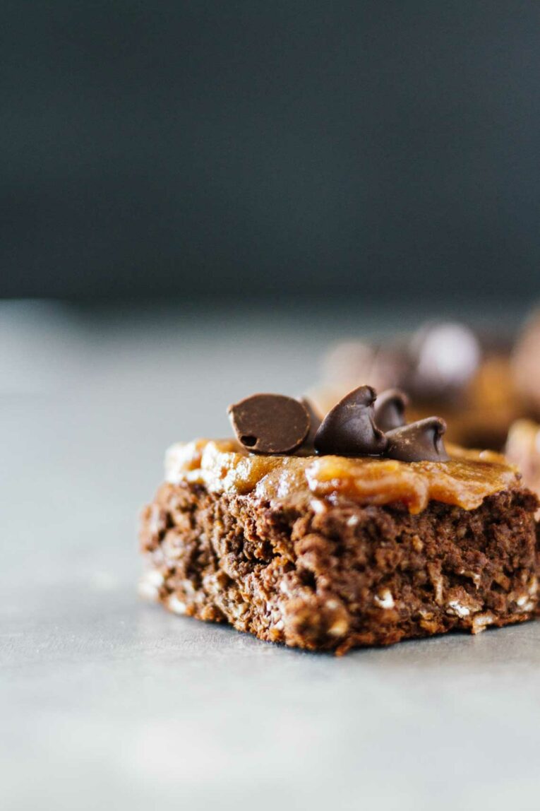 Side view of Healthy Chocolate Brownies w/ Date Caramel Sauce