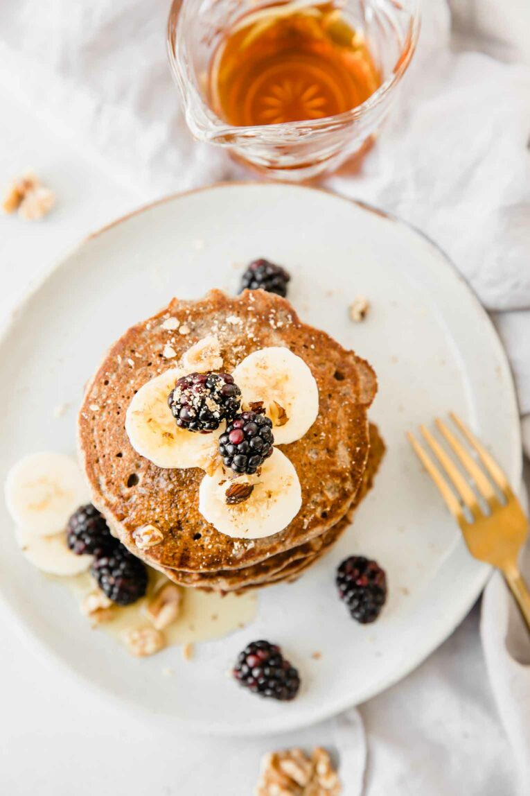 Buckwheat Pancakes with blackberries and syrup.