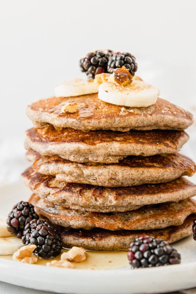 A stack of Buckwheat Pancakes on a white plate