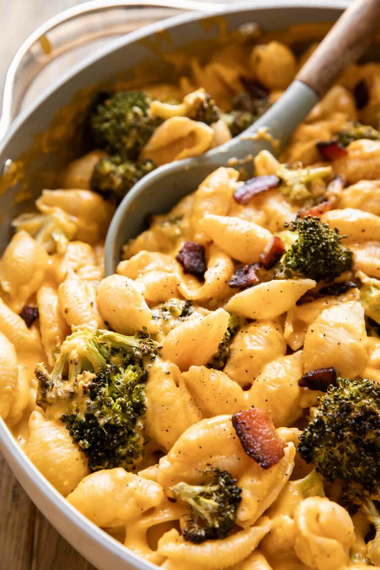 Lightened-Up Butternut Squash Mac & Cheese with broccoli and dried tomatoes.