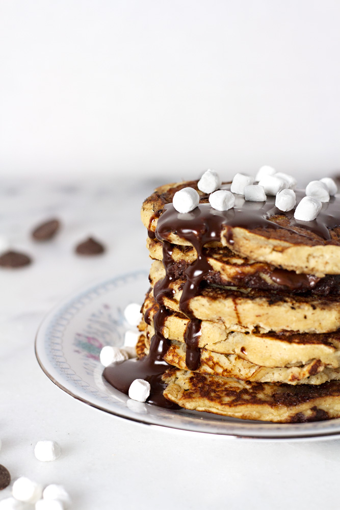 Stack of Healthy S'more Pancakes on a floral plate.