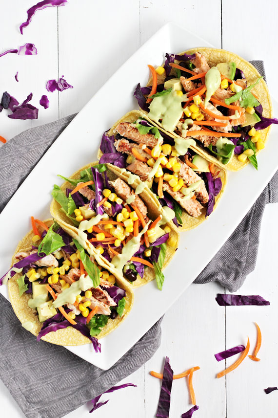  These Spicy Salmon Tacos served on a white tray