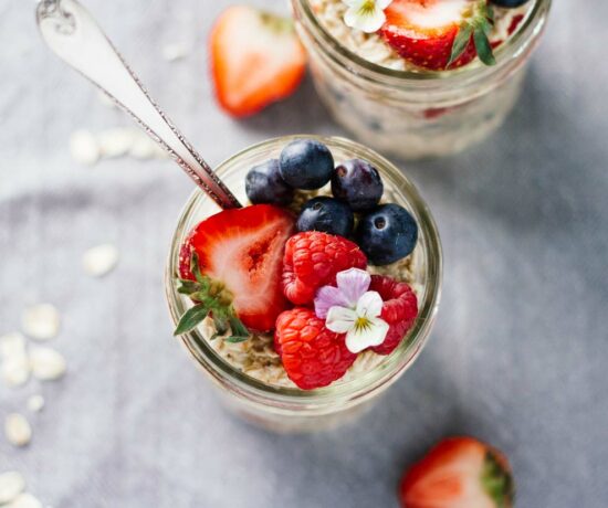 Triple Berry Overnight Oats in a mason jar