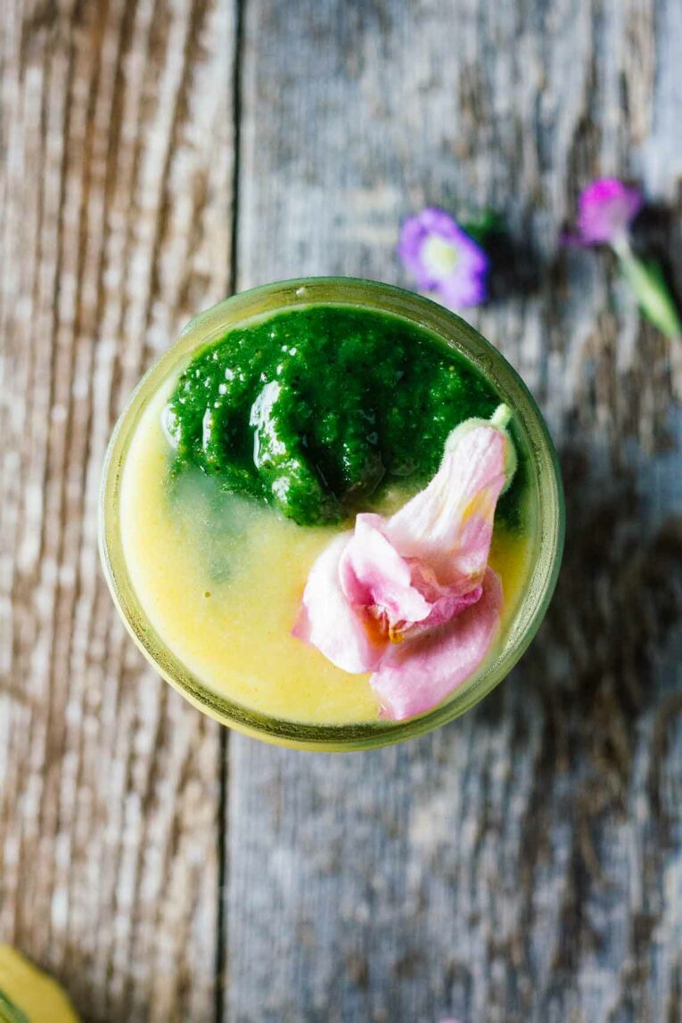 Healthy kiwi pineapple smoothie in a jar.