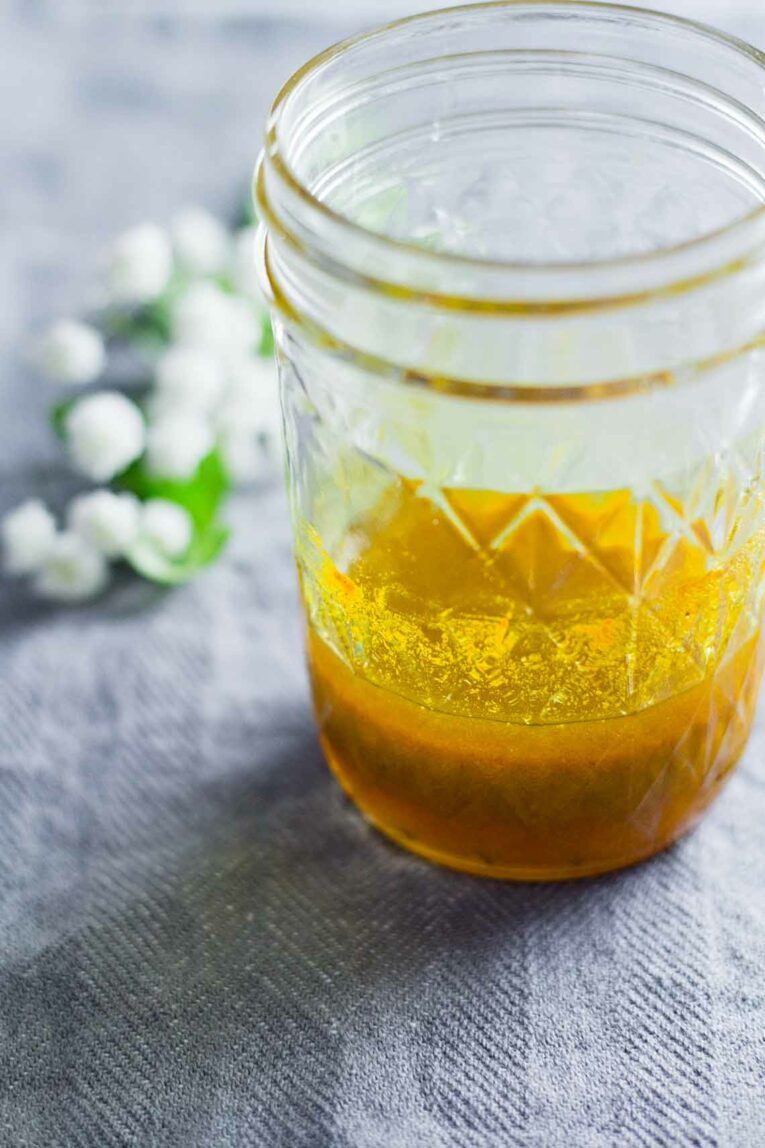 Vegan Turmeric Ginger Dressing in a mason jar