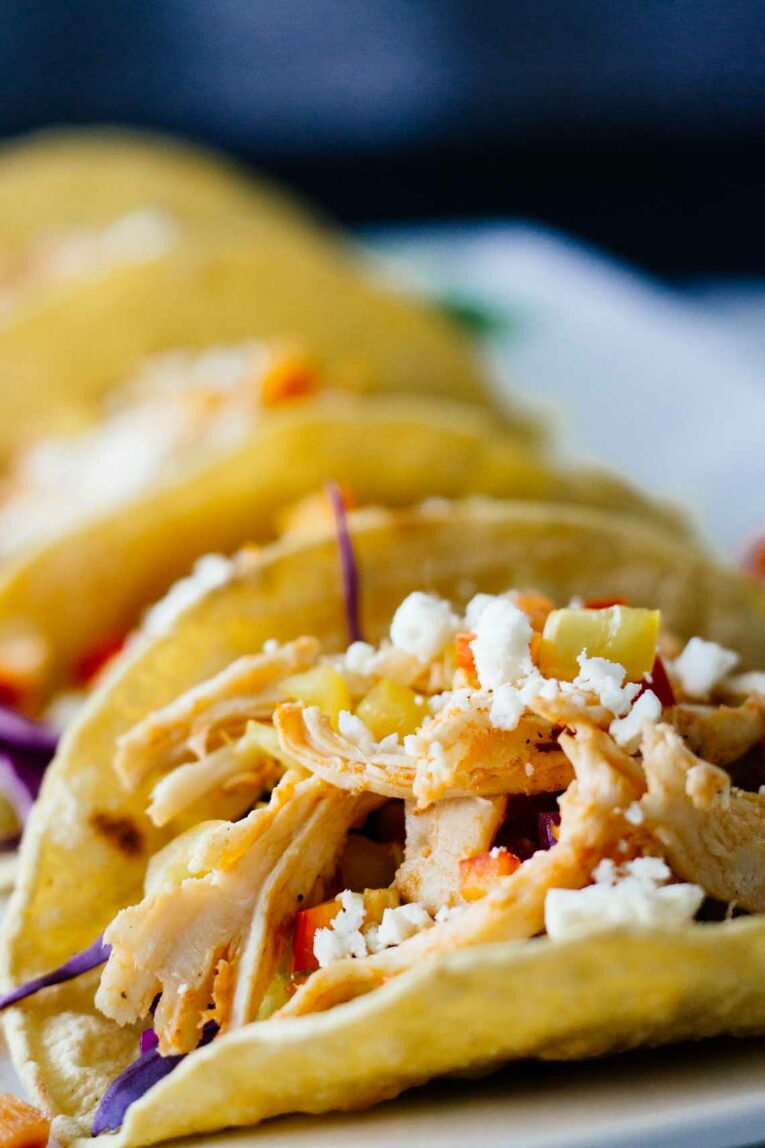 Healthy Sriracha Shredded Chicken Tacos! YUM! Perfect for a quick and easy weeknight meal.