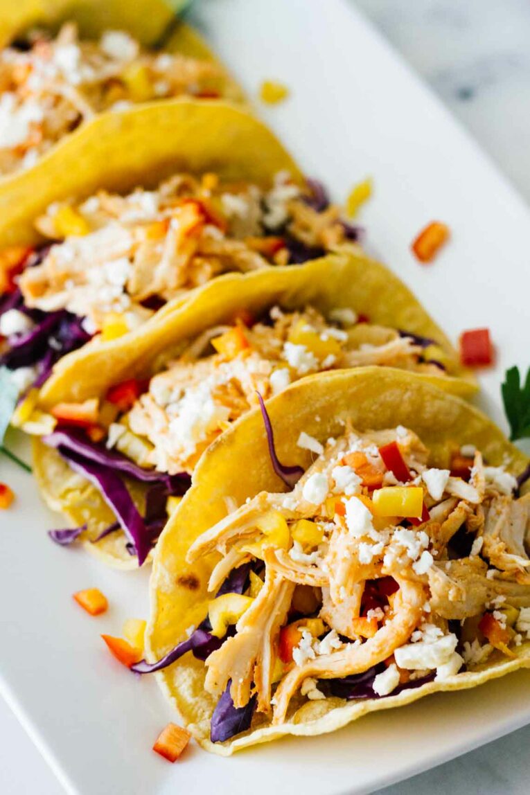 Healthy Sriracha Shredded Chicken Tacos! YUM! Perfect for a quick and easy weeknight meal.