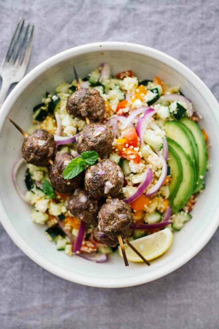 Mediterranean Salad Bowls w/ Lebanese BBQ Meatballs! This gluten-free recipe makes for an easy, healthy weeknight dinner. Also perfect for having people over!