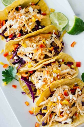Healthy Sriracha Shredded Chicken Tacos! YUM! Perfect for a quick and easy weeknight meal.