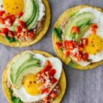 An overhead shot of 3 Huevos Rancheros Breakfast Tostadas!