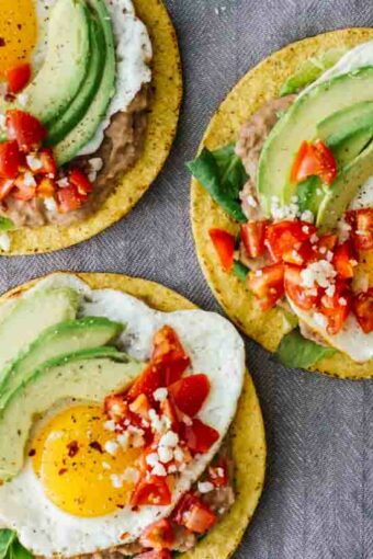 An overhead shot of 3 Huevos Rancheros Breakfast Tostadas!