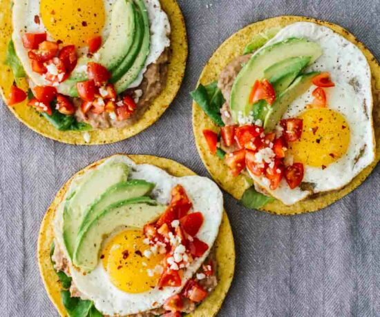 An overhead shot of 3 Huevos Rancheros Breakfast Tostadas!