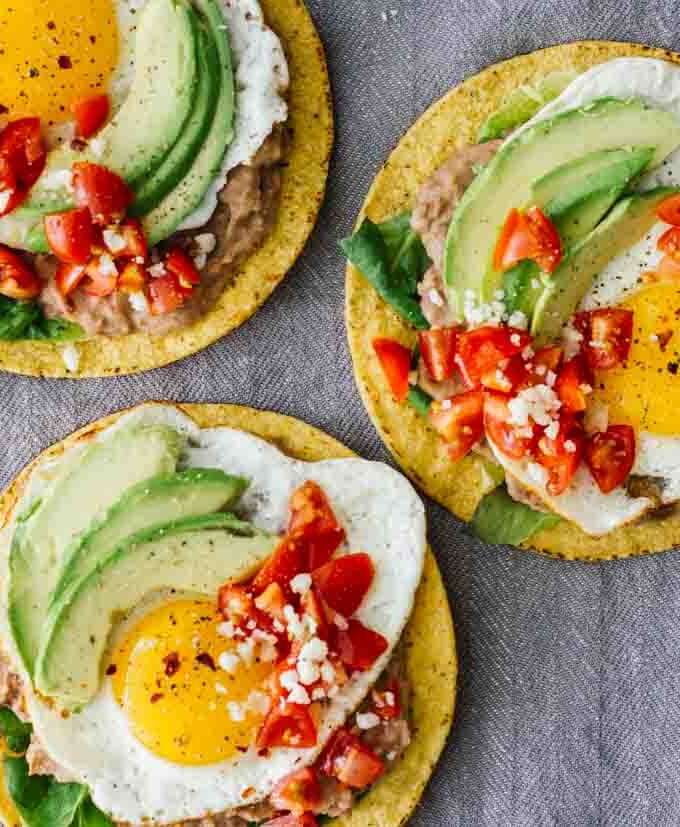 An overhead shot of 3 Huevos Rancheros Breakfast Tostadas!