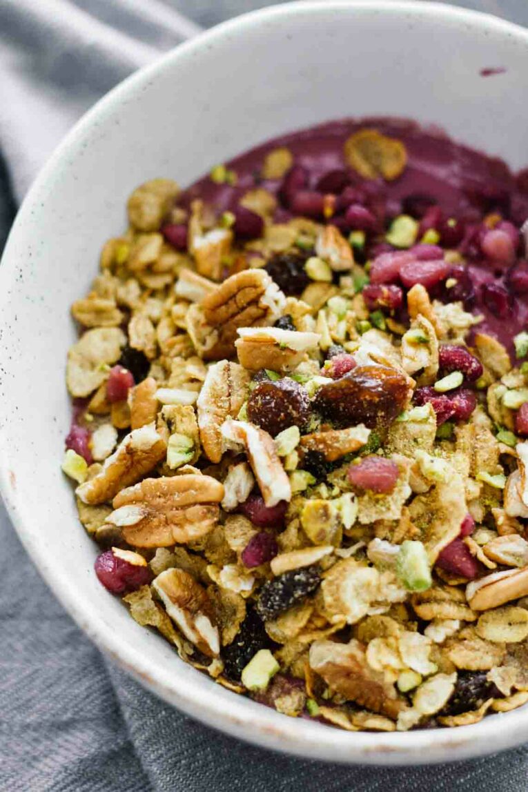A close up of acai bowls topped with granola 