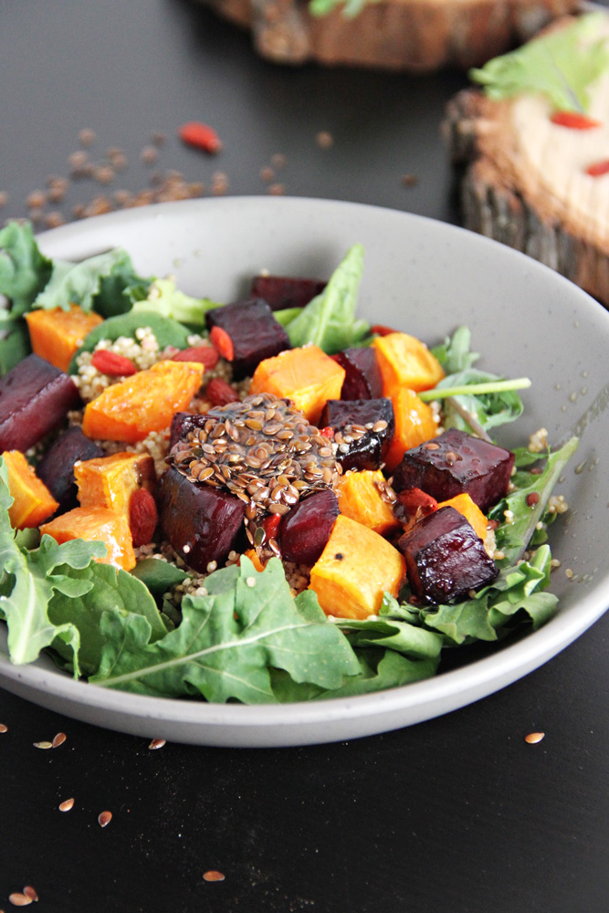 Roasted Beets and Sweet Potato Quinoa Salad in a white bowl