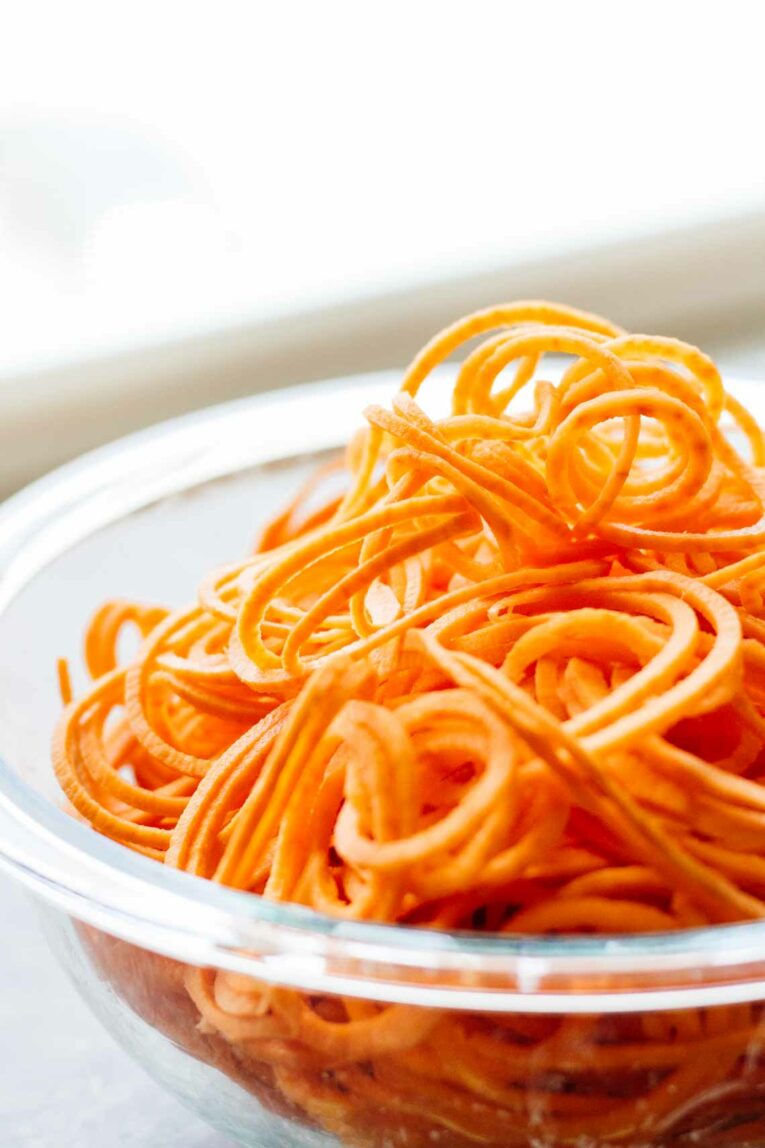 sweet potatoes spiraled in a glass bowl