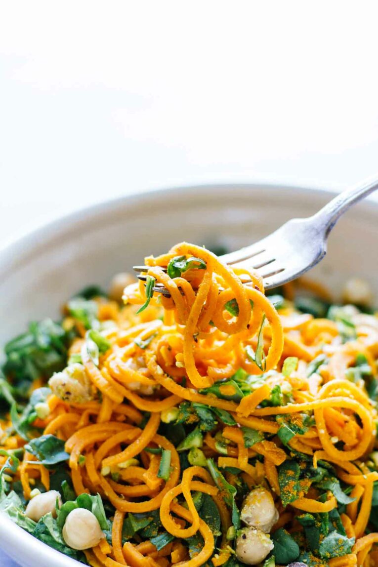 a fork scooping into Turmeric Sweet Potato Pasta Salad