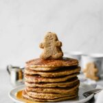 Sweet, wholesome, Healthy Gingerbread Oatmeal Pancakes Recipe that's perfect for this holiday season! Made with rolled oats, yogurt, and banana (gluten free). Serve for holiday brunch or freeze for easy breakfast meals throughout the week!