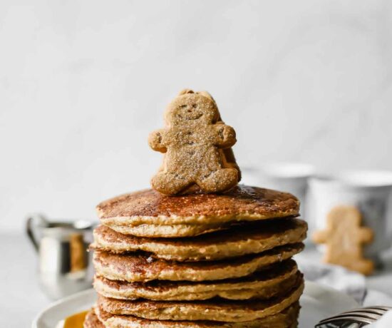 Sweet, wholesome, Healthy Gingerbread Oatmeal Pancakes Recipe that's perfect for this holiday season! Made with rolled oats, yogurt, and banana (gluten free). Serve for holiday brunch or freeze for easy breakfast meals throughout the week!