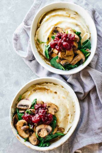 Slow Cooker Mashed Potatoes & Cranberry Mushroom Sauce! Vegan, vegetarian, gluten-free, and perfect for thanksgiving or a fall weeknight meal!