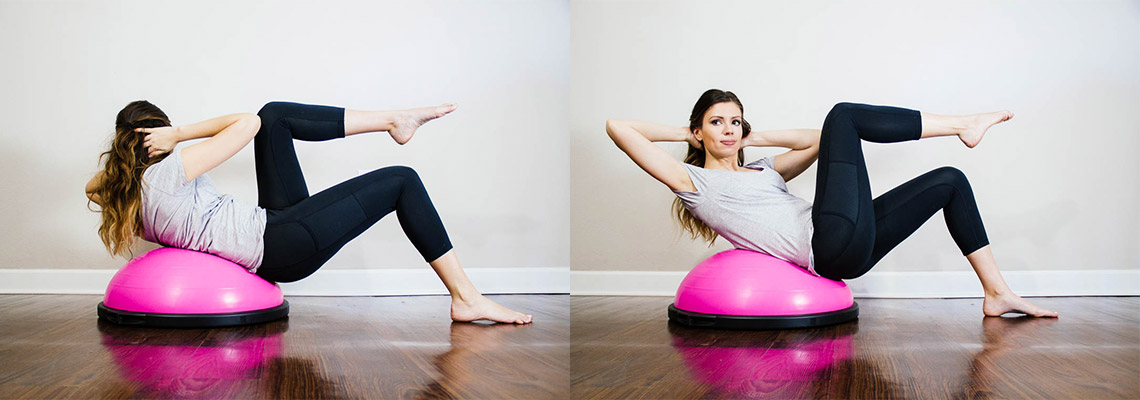 girl doing ab poses on a workout ball