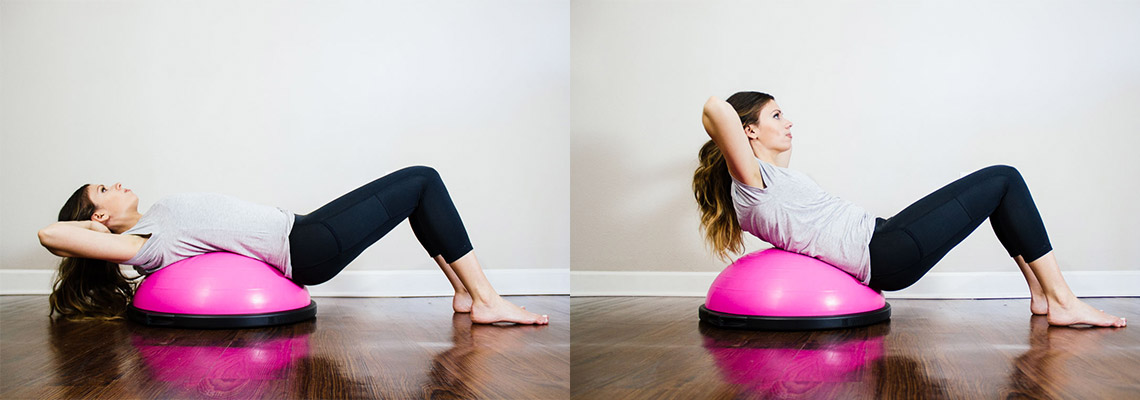 girl doing ab poses on a workout ball