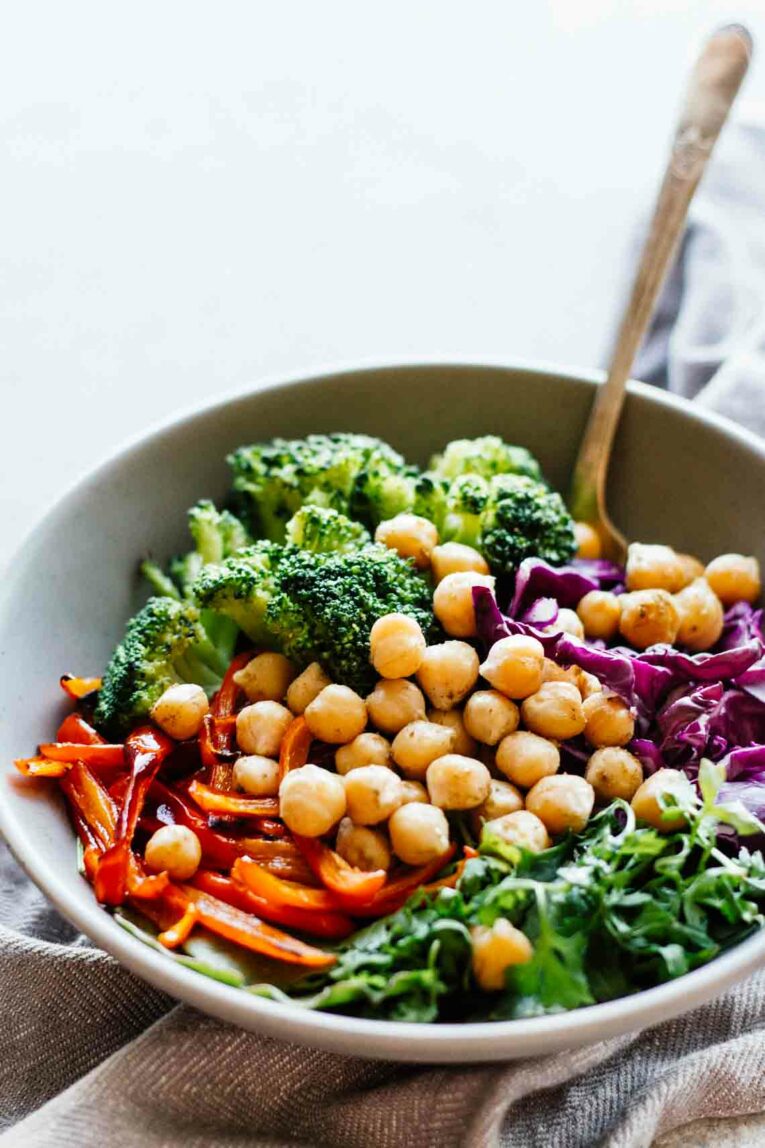 close up shot of Broccoli & Chickpea Rainbow Power Bowls with a fork