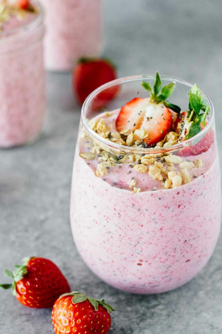 Strawberry Banana Chia Seed Smoothie in a class sitting on a counter. 
