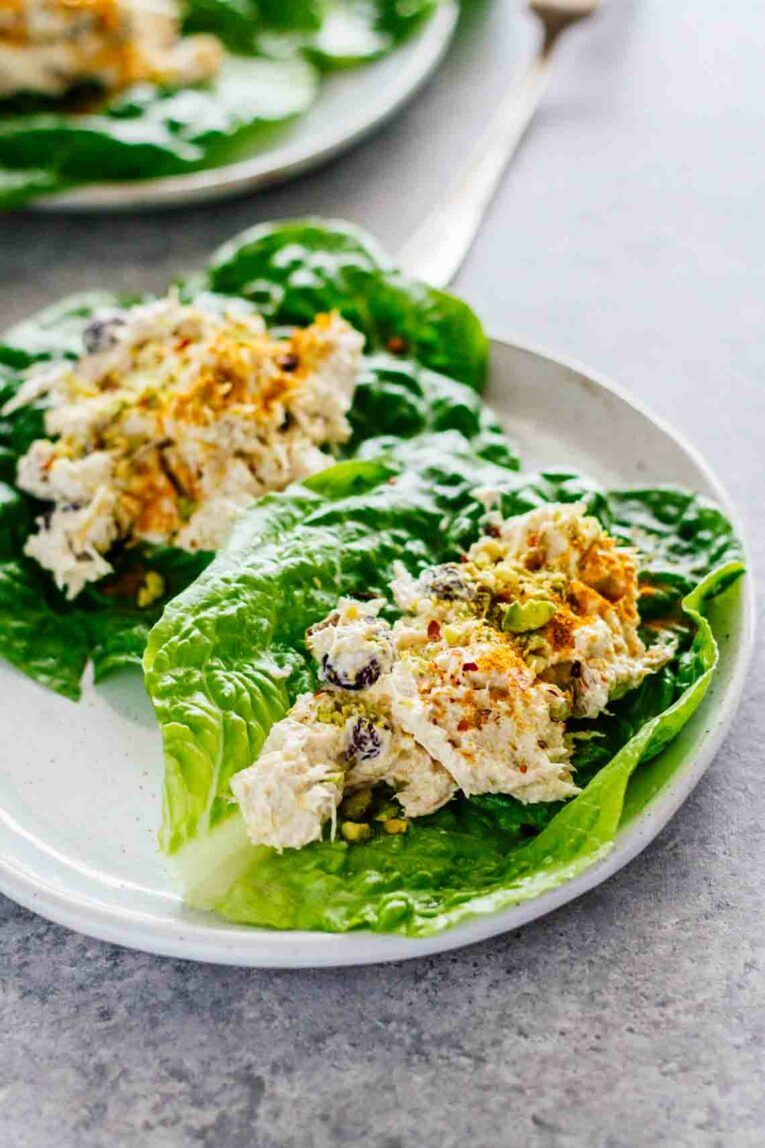Turmeric Greek Yogurt Chicken Salad Lettuce Wraps on a white plate