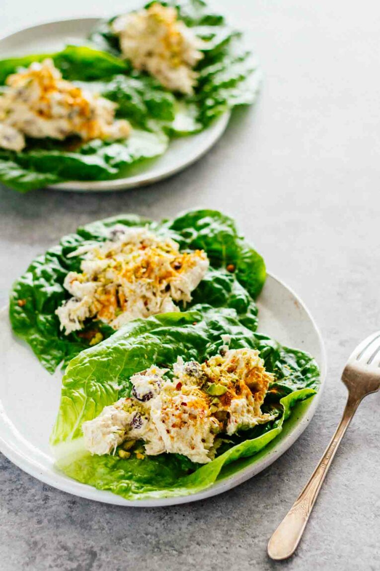 Turmeric Greek Yogurt Chicken Salad Lettuce Wraps served on white plates