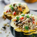 Quinoa & Mushroom Stuffed Acorn Squash! Gluten-free, vegan, and vegetarian. Super easy to make!