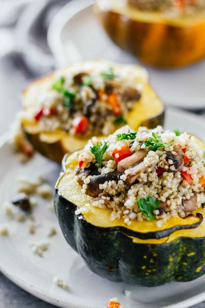 Quinoa & Mushroom Stuffed Acorn Squash! Gluten-free, vegan, and vegetarian. Super easy to make!