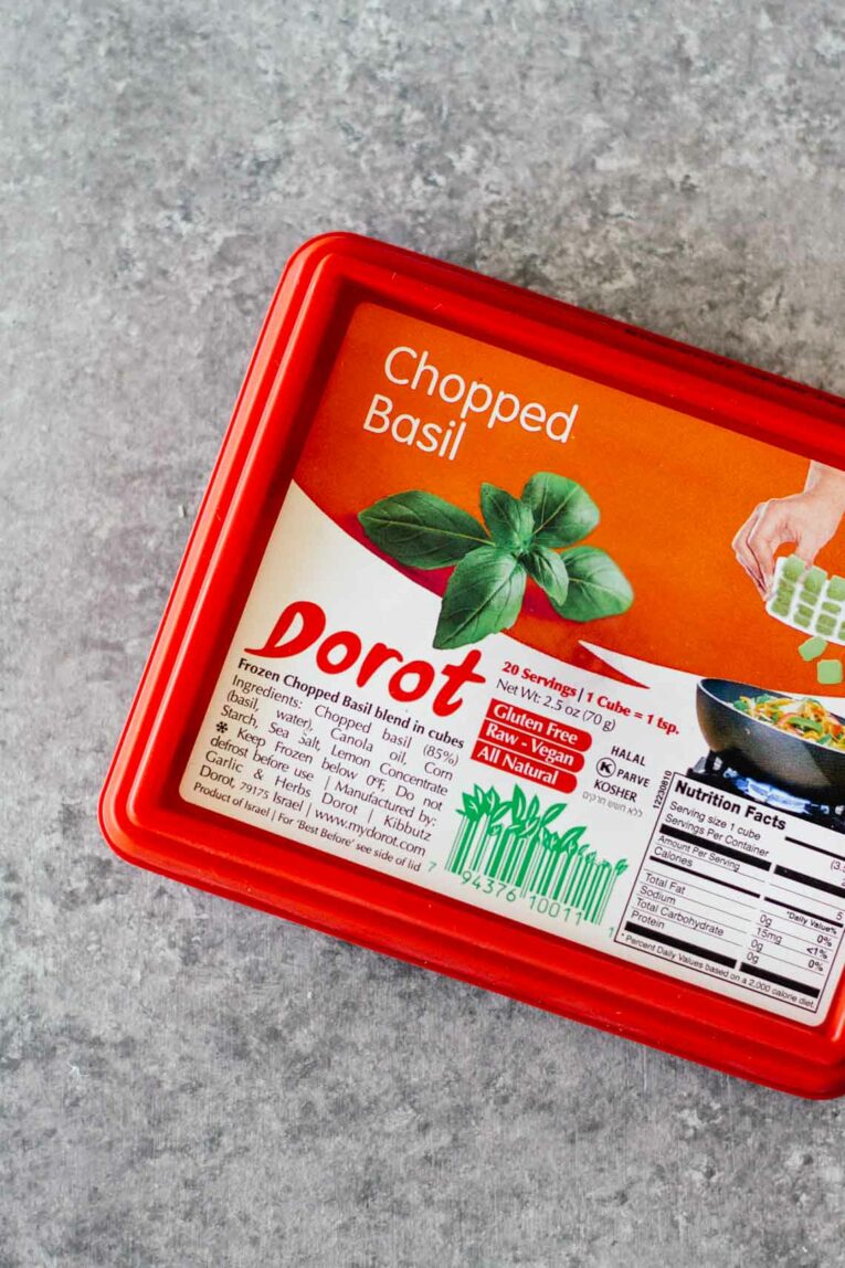 An overhead shot of Dorot chopped basil packaging