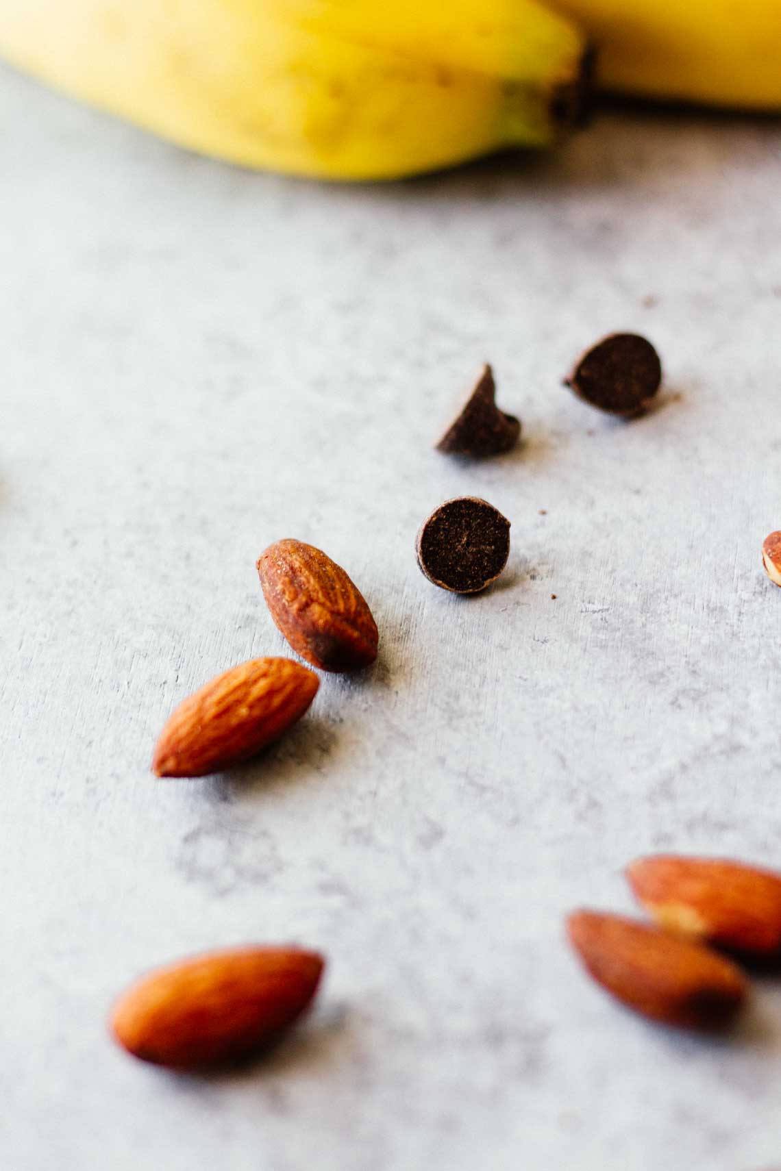 almonds and chocolate chips on a counter