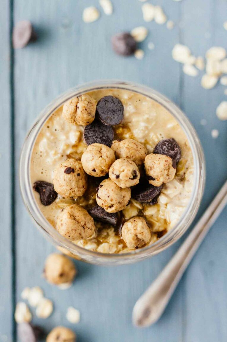 Overhead shot of Chocolate Chip Cookie Dough Overnight Oats in a glass