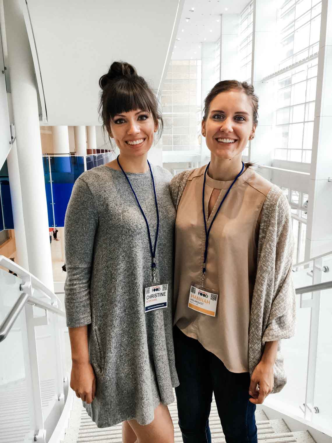 picture of two girls at a conference