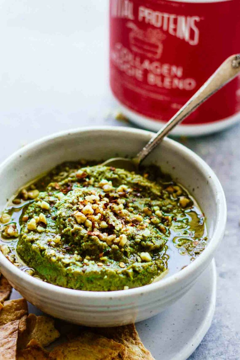 5-Minute Green Hummus in a white bowl with a spoon