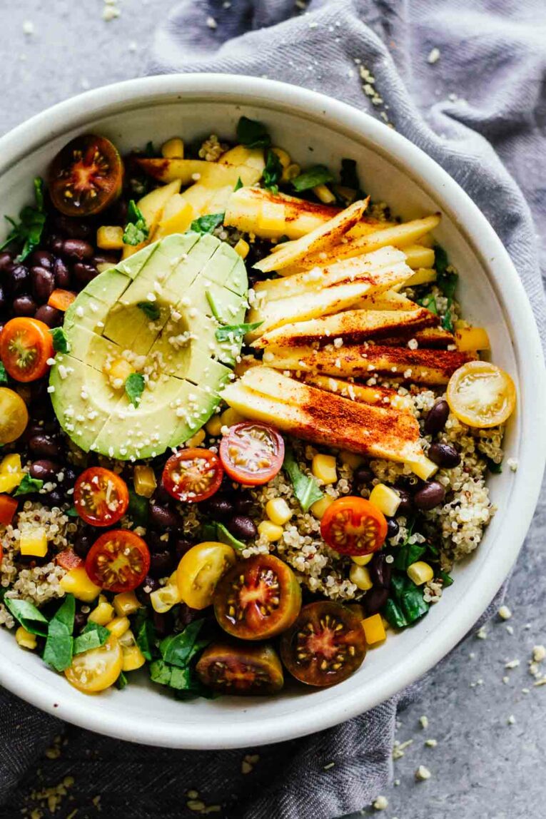 Chili Mango Zesty Quinoa Salad in a grey bowl.