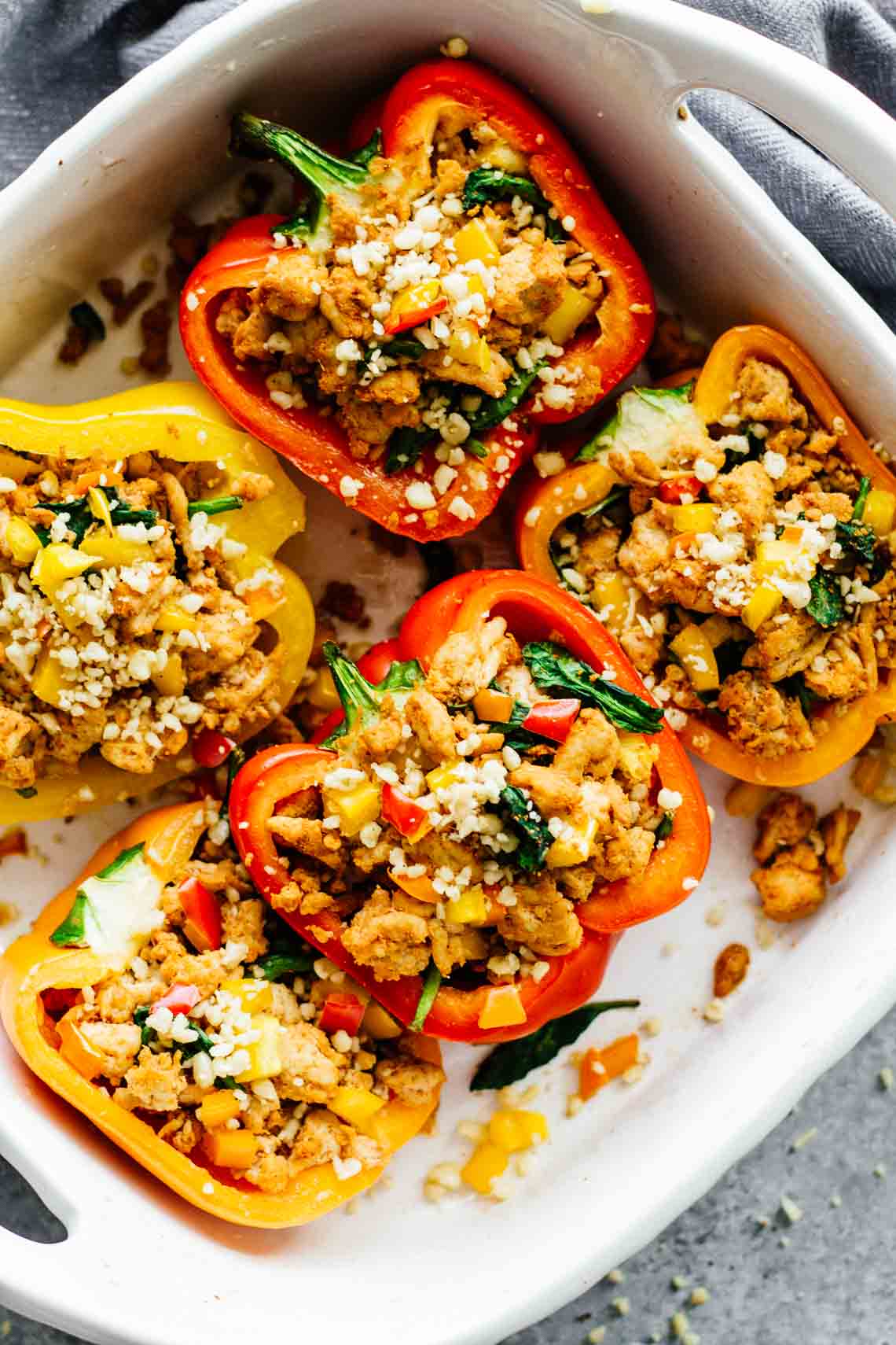 Spicy Southwest Whole30 Stuffed Peppers in a casserole dish
