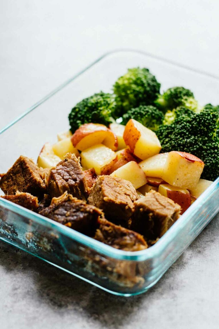 side angle of Steak-Potatoes-Meal-Prep-Bowls in a glass dish