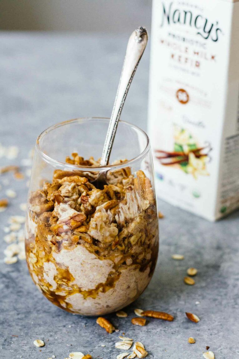 Maple Cinnamon Pecan Overnight Oats in a glass with Nancy's Yogurt!