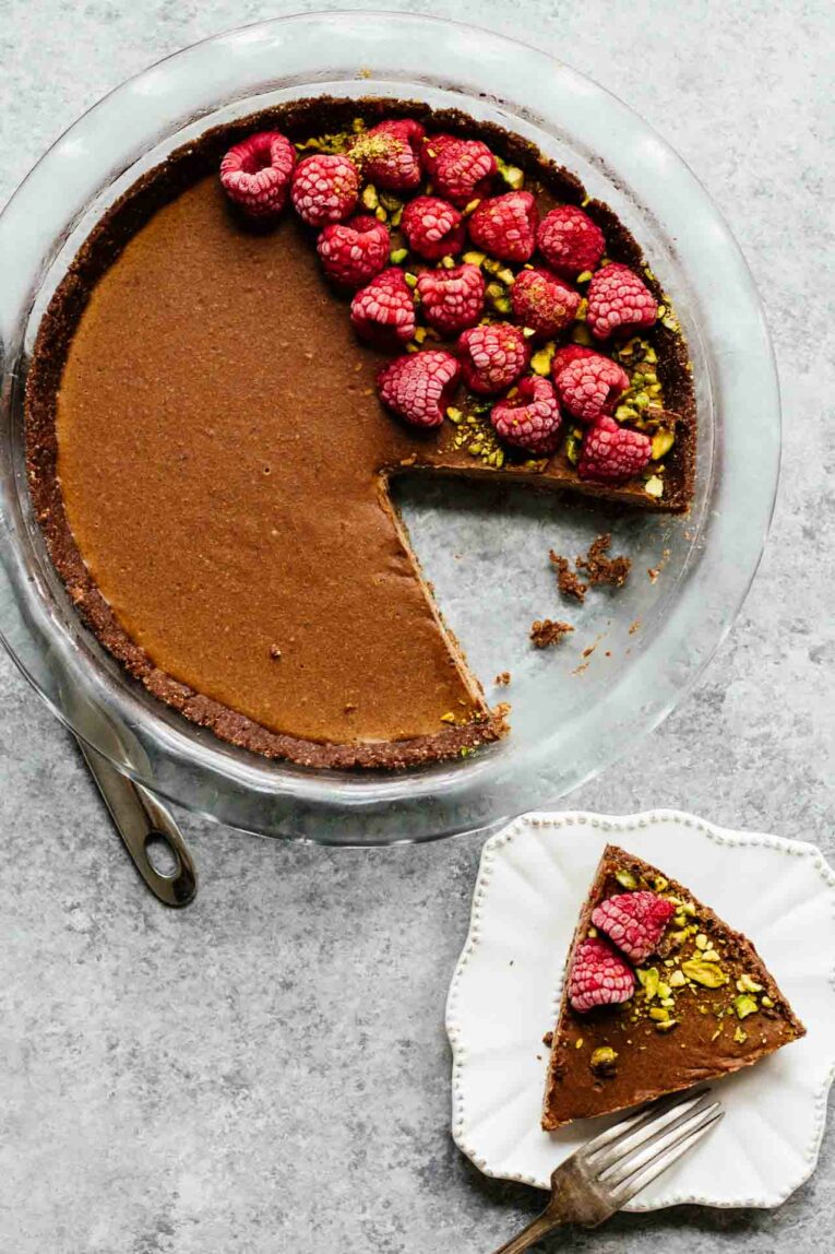 Overhead shot of No-Bake Chocolate Hazelnut Pie w/ slice taken out