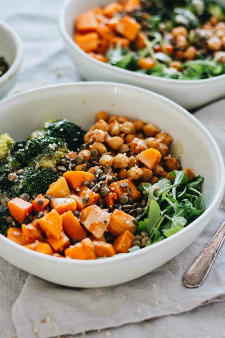 Vegan Chickpea & Sweet Potato Bowls served in two white bowls.