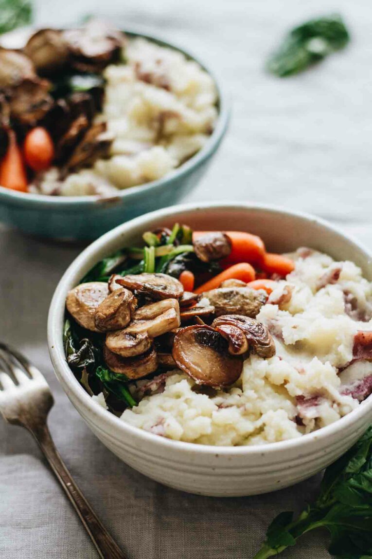 Vegan Loaded Mashed Potato Bowls served in two bowls