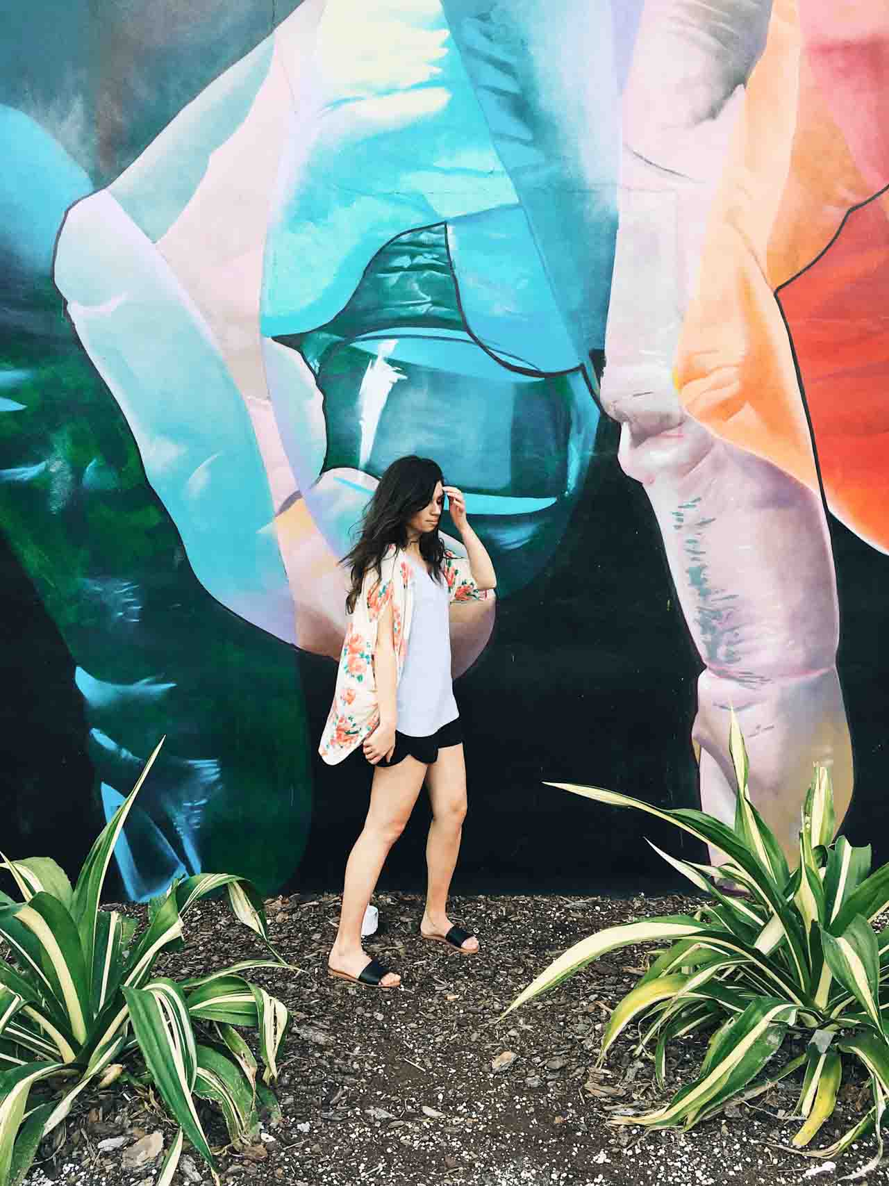Girl in front of wall at Wynwood walls in Miami! 