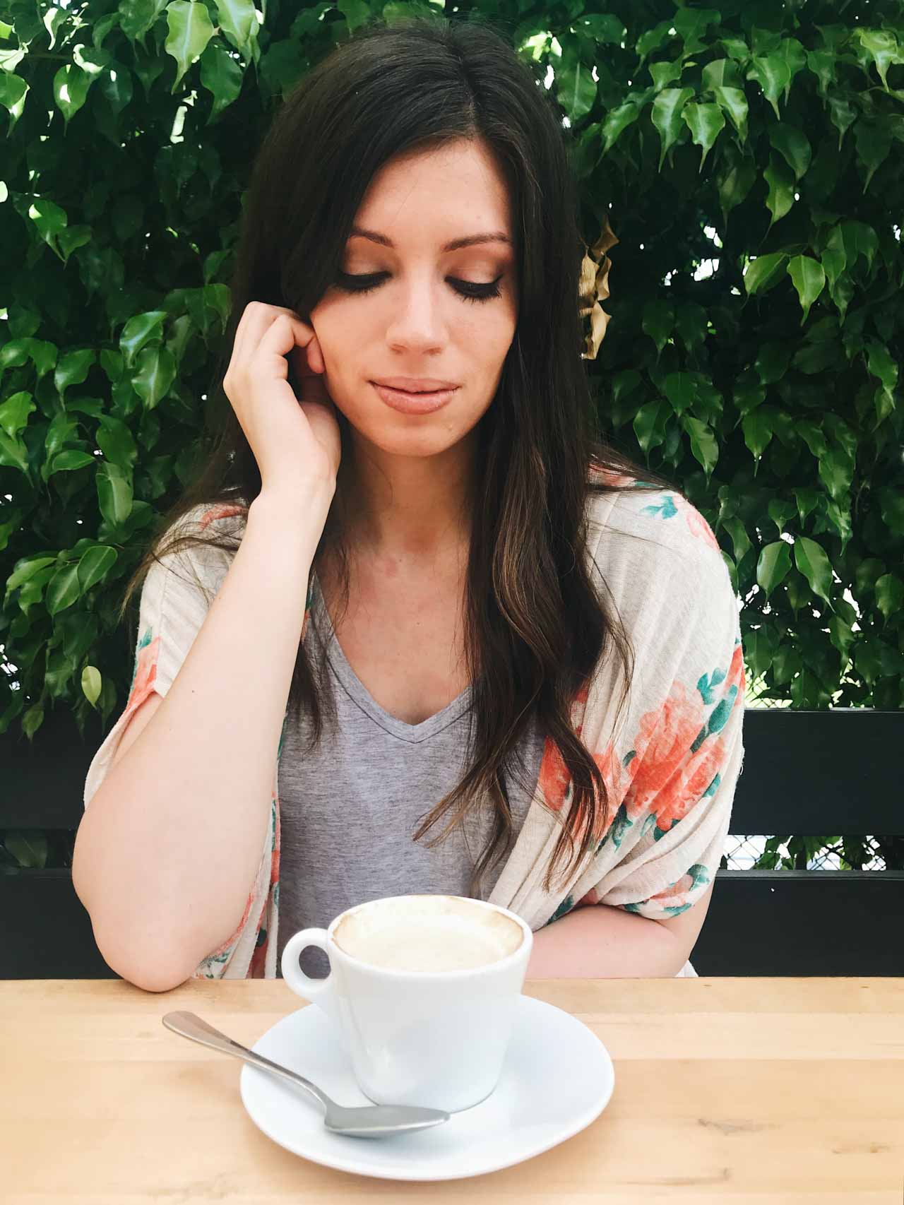 Girl with coffee at brunch in Miami